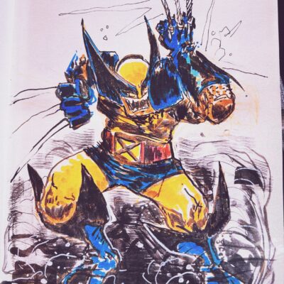 sketch of the comic book character Wolverine, done with black ink and colored markers. The line is very broad, noisy and stylized. The character is in full body, slightly crouched and with his arm raised as if defending himself from an attack.